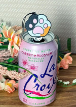 The Calico Cat Toe Beans Soda Tab Buddy.