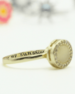 The Cherry Blossom Fidget Ring with the engraving: You Are My Sunshine.