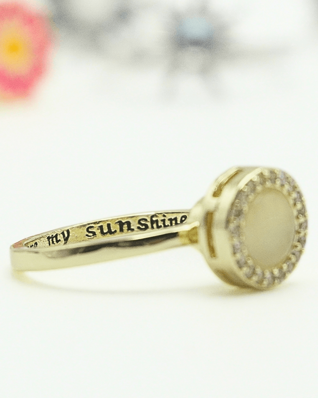 The Cherry Blossom Fidget Ring with the engraving: You Are My Sunshine.