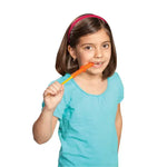 A child chews on a Chew Stixx Jr.