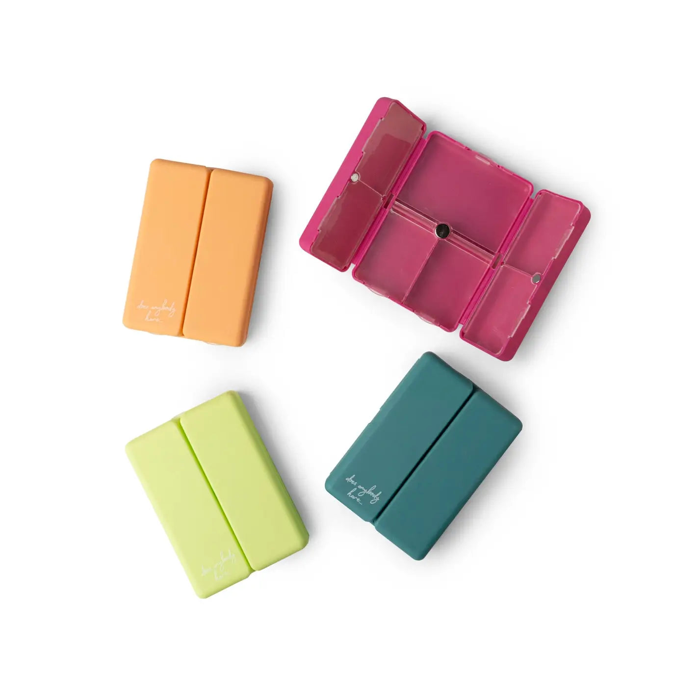 The four colors of the Crush Everything's Fine Pill and Vitamin Case.