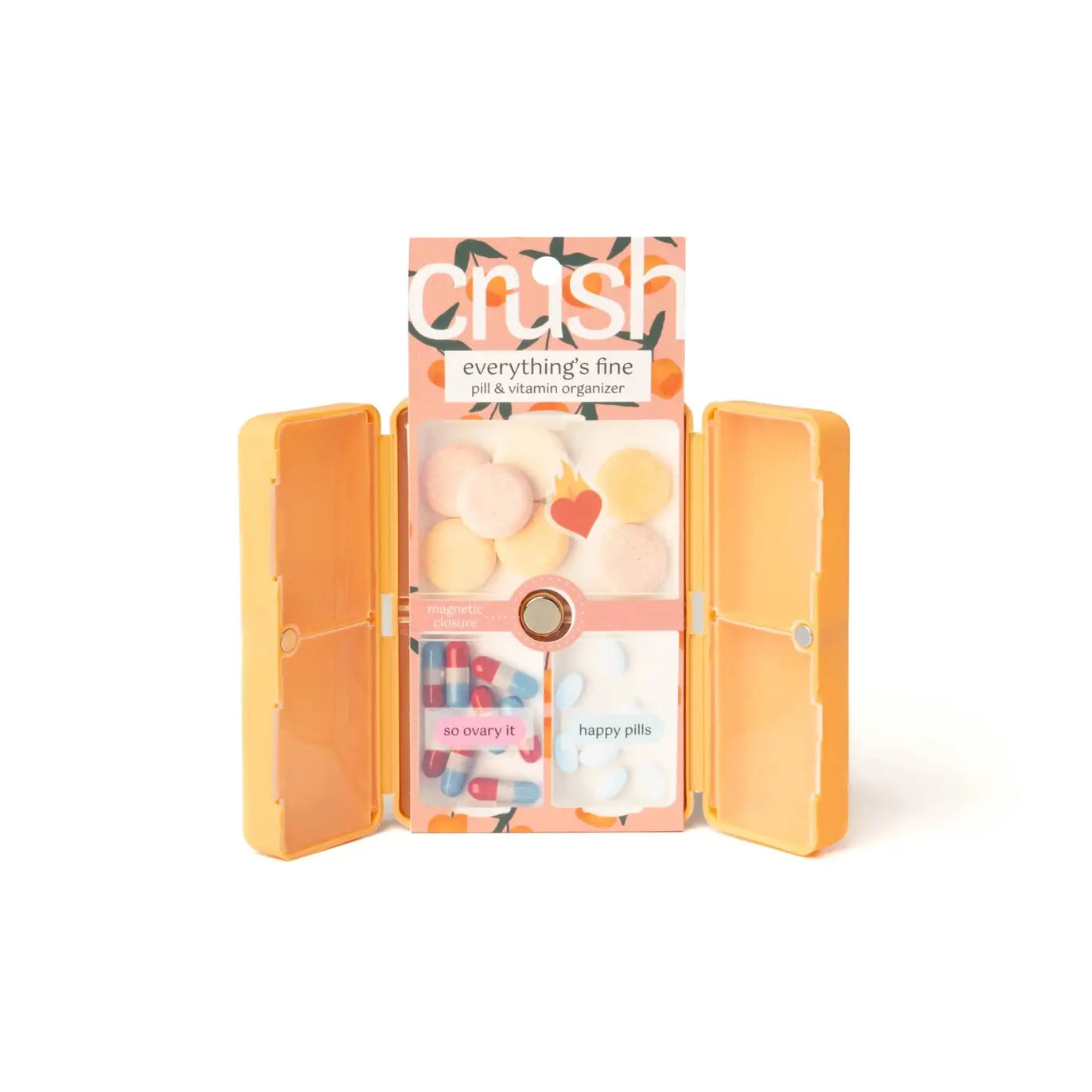The peach Everything's Fine Pill and Vitamin Case.