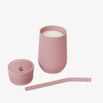 The cup, lid, and straw of the EZPZ Blush Cup + Straw System.