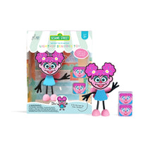 The Abby Cadabby Sesame Street Glo Pals product box and toy.