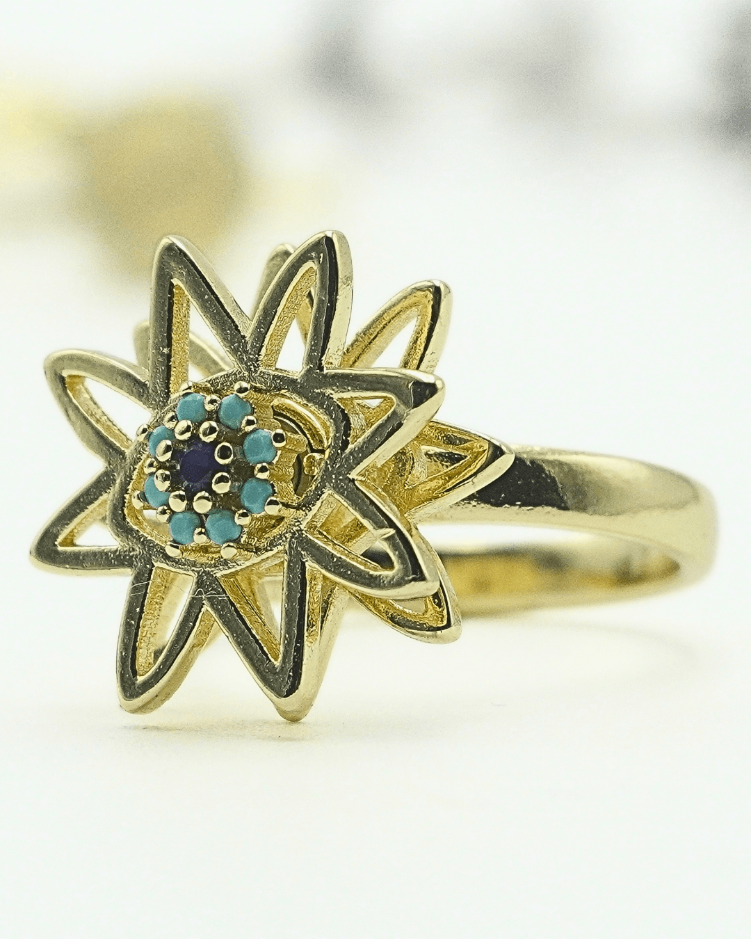 The Dainty Evil Eye Flower Spinner in Solid Copper.