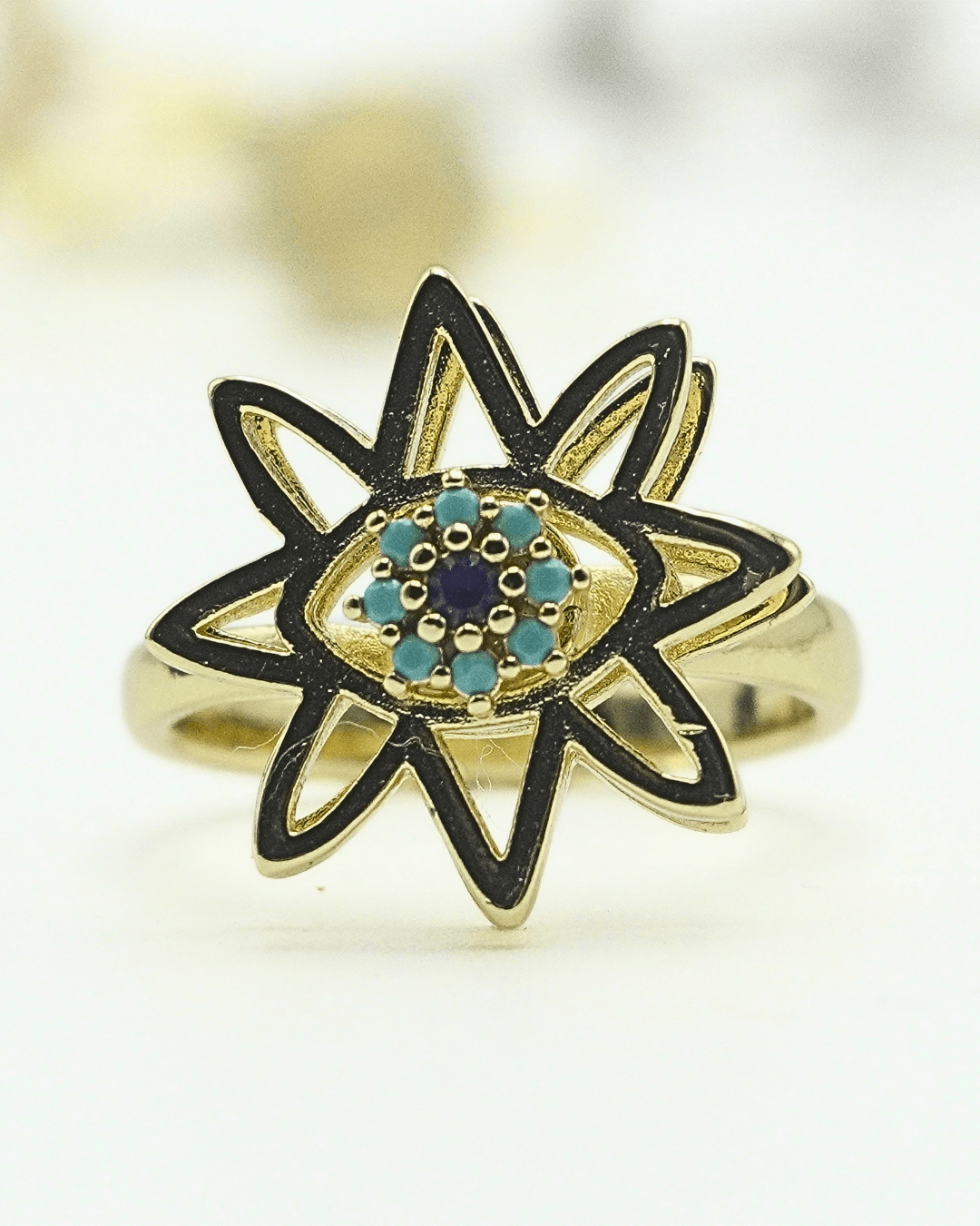 The Dainty Evil Eye Flower Spinner in Solid Copper.
