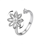 The silver Daisy Pearl Fidget Spinner Ring.