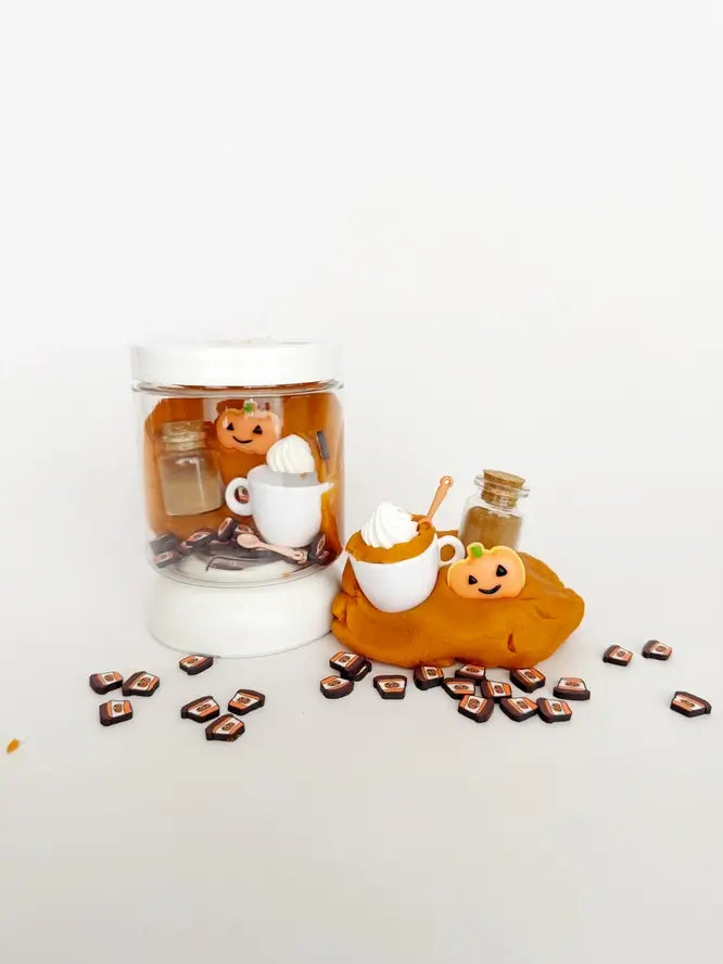 The Mini Dough-to-Go Kit in the package and displayed next to it.