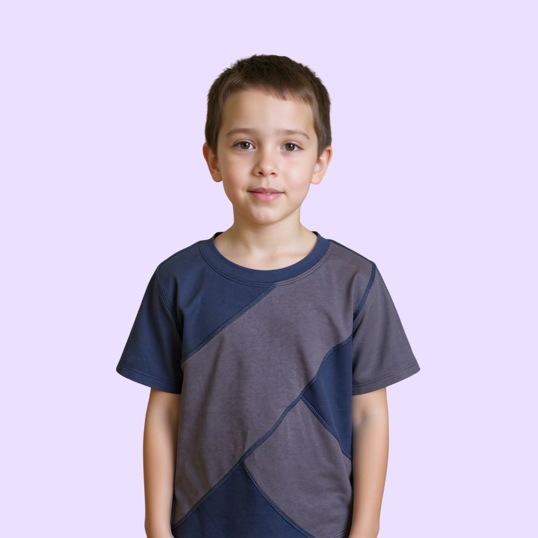 A child wears the Navy and Grey Kids Easy-to-See Sensory Friendly T-shirt.
