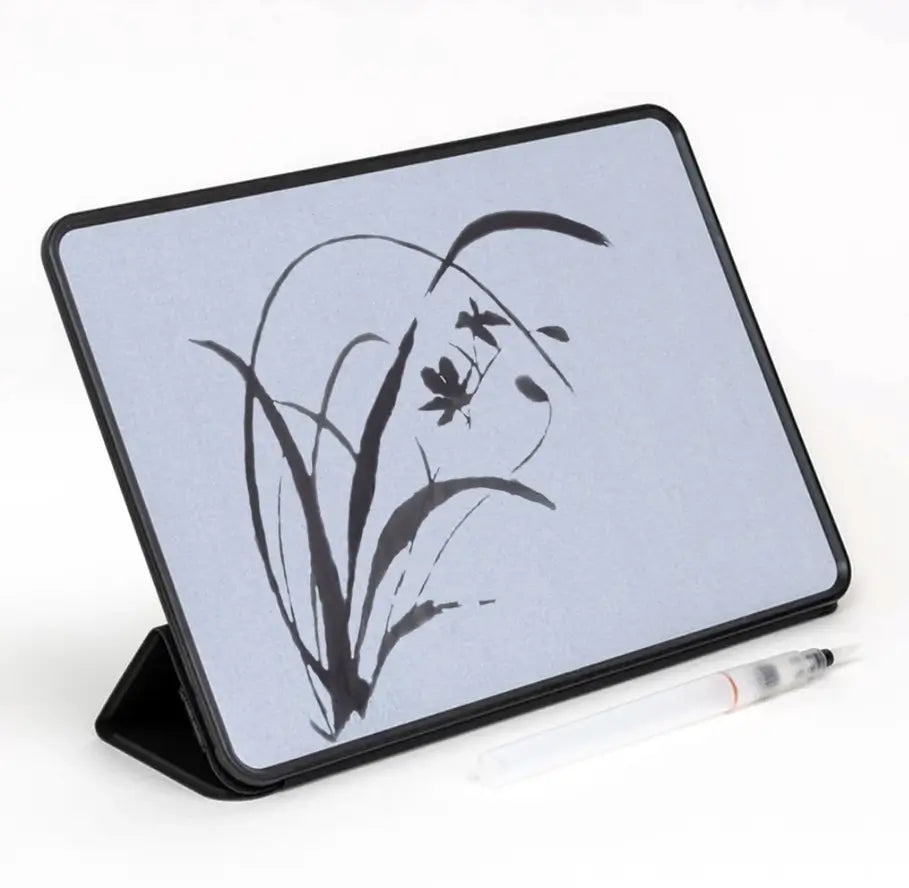 The Buddha Board Enso with a botanical water drawing.