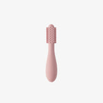 The back of the Blush ezpz Baby-Led Toothbrush.