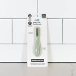 The Sage ezpz Baby-Led Toothbrush in its product package.
