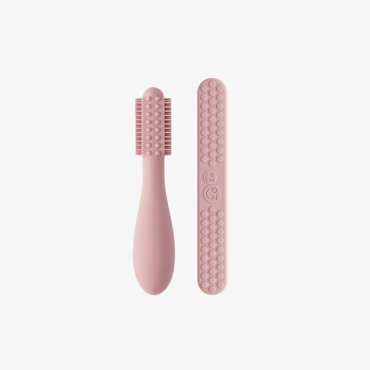 The back of the Blush ezpz Baby-Led Toothbrush and Tongue Depressor Combo.