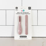 The Blush ezpz Baby-Led Toothbrush and Tongue Depressor Combo.