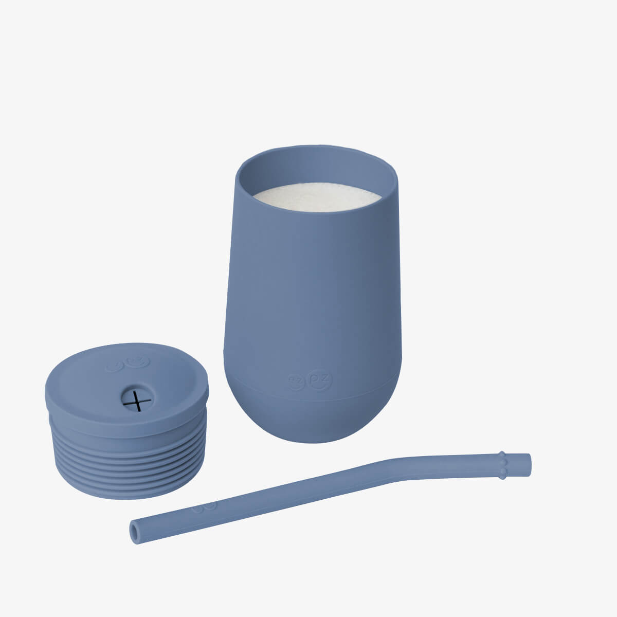 The three separate components of the Indigo Happy Cup and Straw System.
