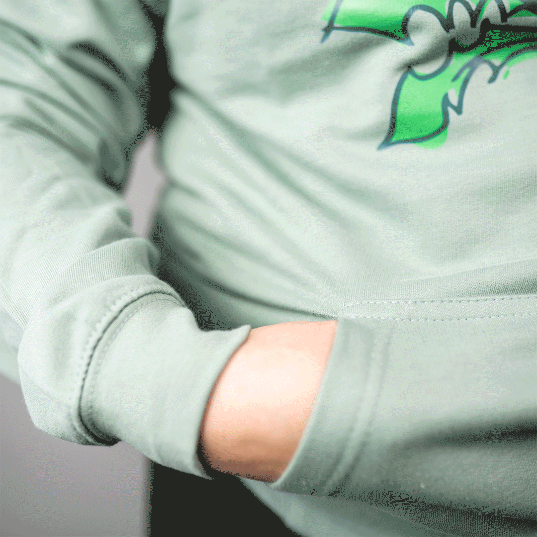 An animated GIF shows someone reaching into the fidget pocket to pull it out.