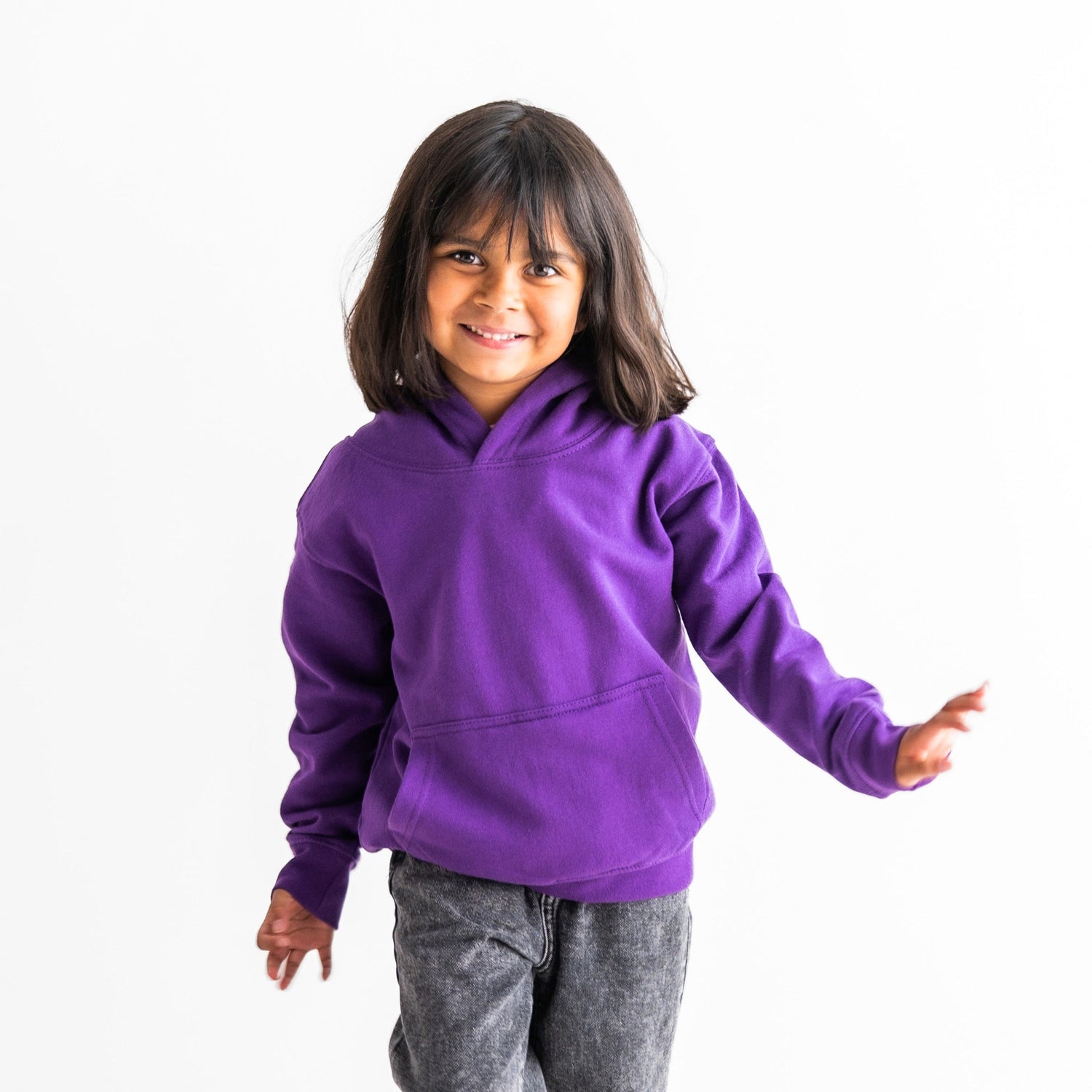 A child wears the Pleasant Purple Youth Fidget Hoodie.