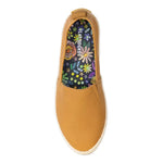 An aerial view of the Floral Embroidery Flat Socks in an orange slip-on shoe.