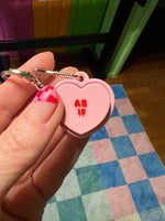 The As If Conversation Heart Fidget Clicker Keychain.