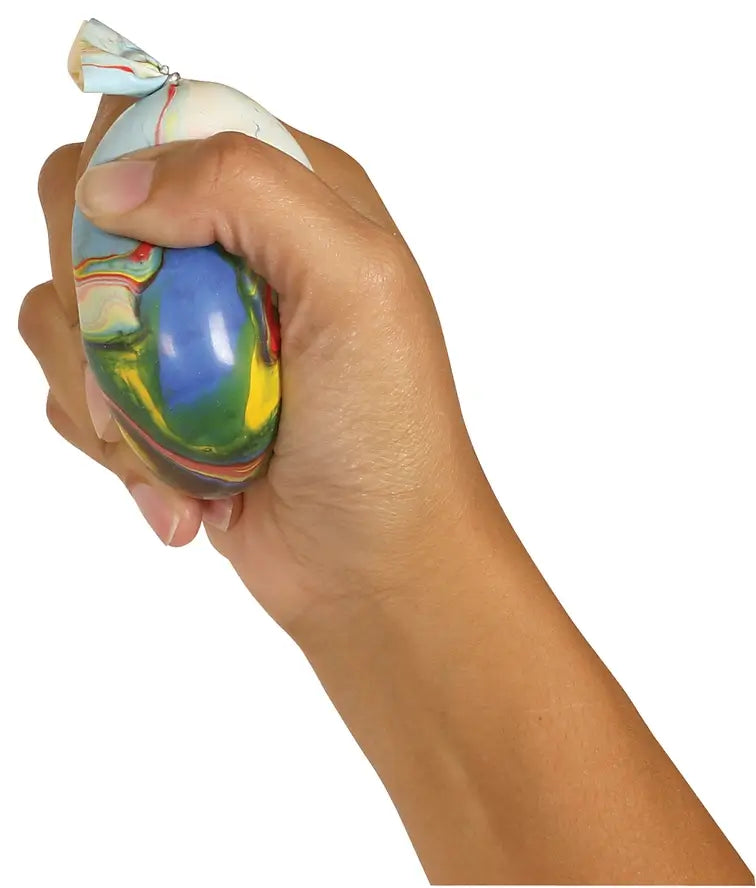 A hand squeezes the IsoFlex Stress Ball.