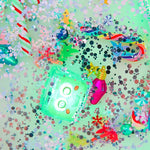 The Glo Pals Winter Wonderland Fun Filler Pack with a lit up Glo Pal.