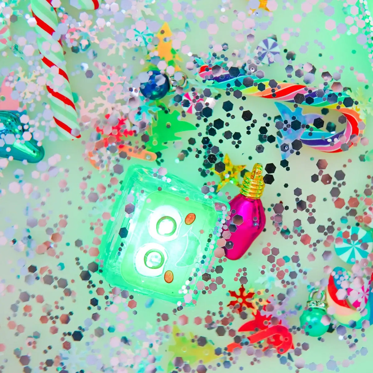 The Glo Pals Winter Wonderland Fun Filler Pack with a lit up Glo Pal.