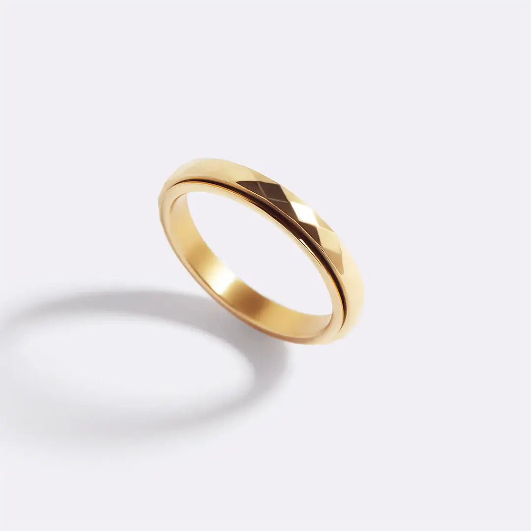 The Mint & Lily Gold Dainty Hammered Band Spinning Fidget Ring.