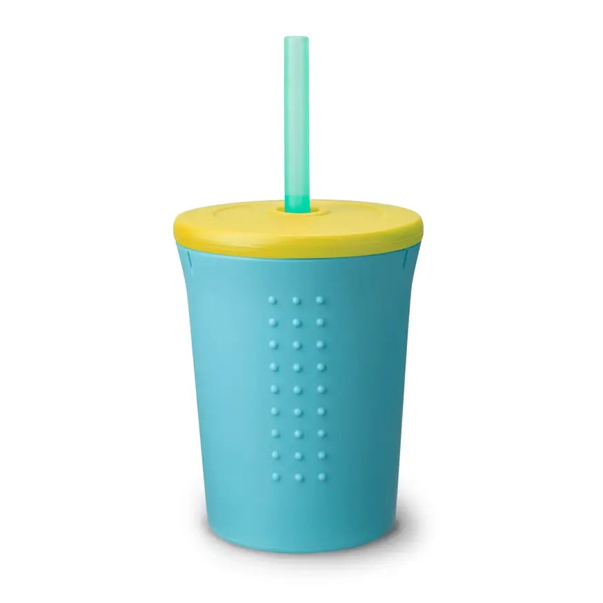 The green 12 oz Silicone Straw Kids Cup with the lid on.
