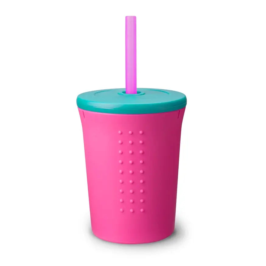 The pink 12 oz Silicone Straw Kids Cup with the lid on.