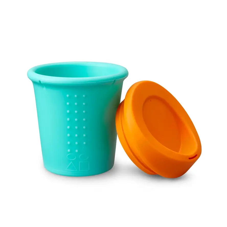 The green 8 oz Silicone Kids to Go Travel Cup with the lid off.