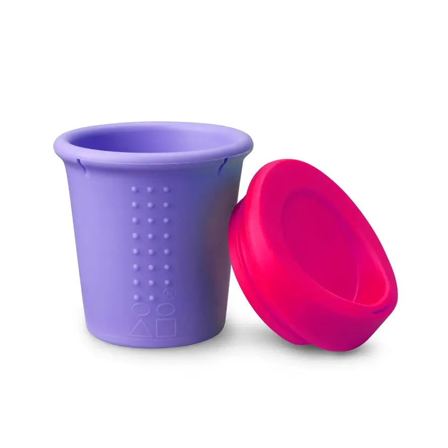 The purple 8 oz Silicone Kids To Go Travel Cup with the lid off.