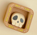 The Spooky Skull Square Mini Book Nook Clicker.