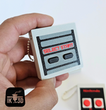 The Select/Start Retro Game Controller Fidget Clicker Keychain.