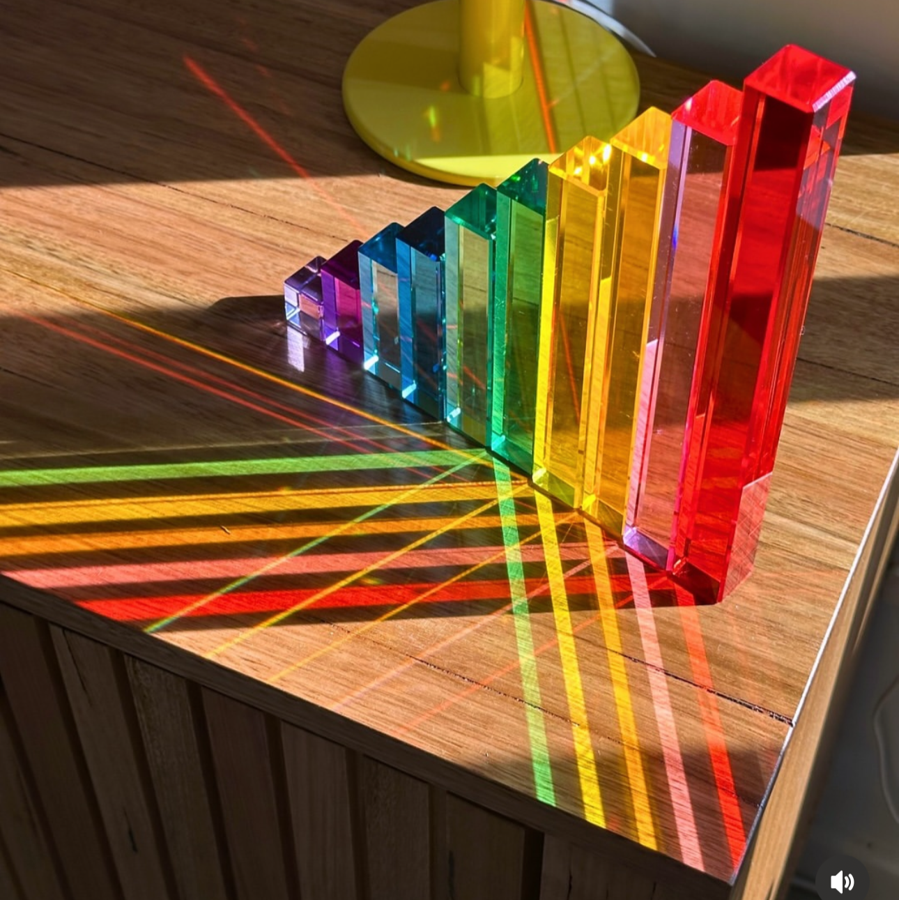 Light refracting from the 10-Piece Crystal Clear Pyramid Lucite Blocks.