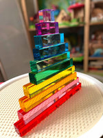 The 10-Piece Crystal Clear Pyramid Lucite Blocks stacked largest to smallest.