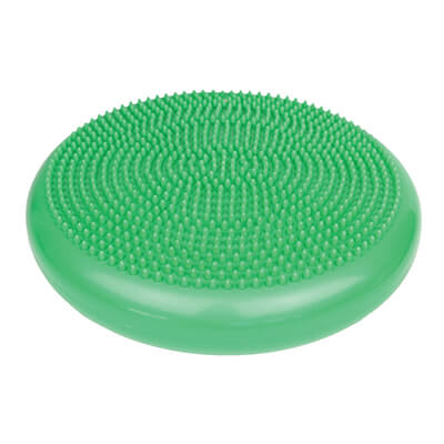 The nubby side of the green Inflatable Balance Disc.