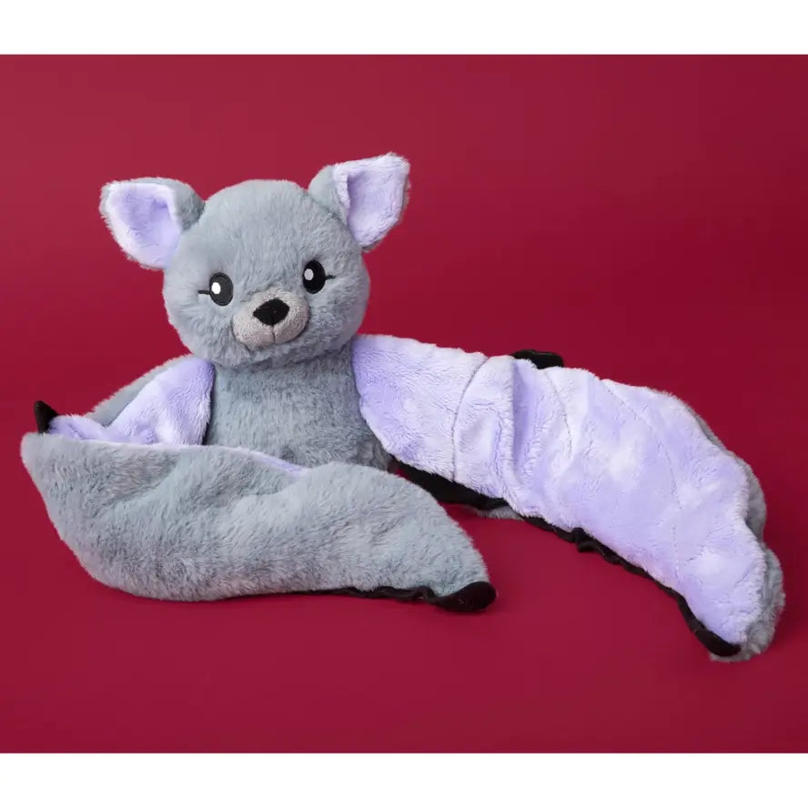 Berkeley the Bat poses on a red background.