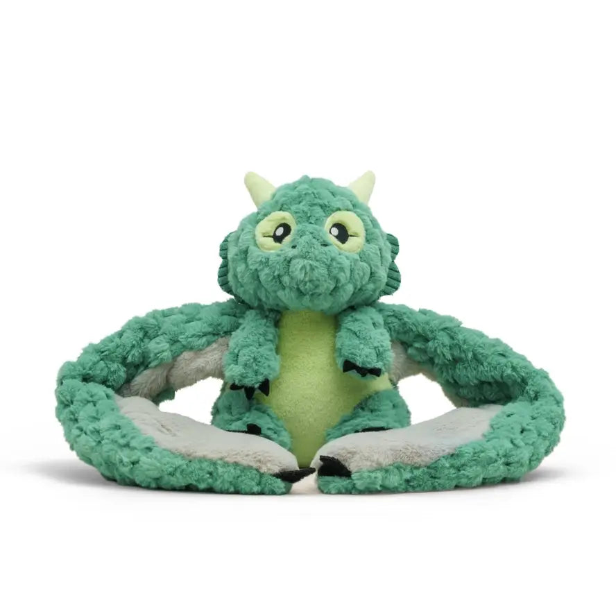 Zephyr the Dragon Hugaround with its wings folded.