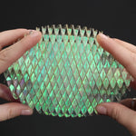 The shiny opalescent quality of the  Morf Fidget Worm 8" Unicorn.