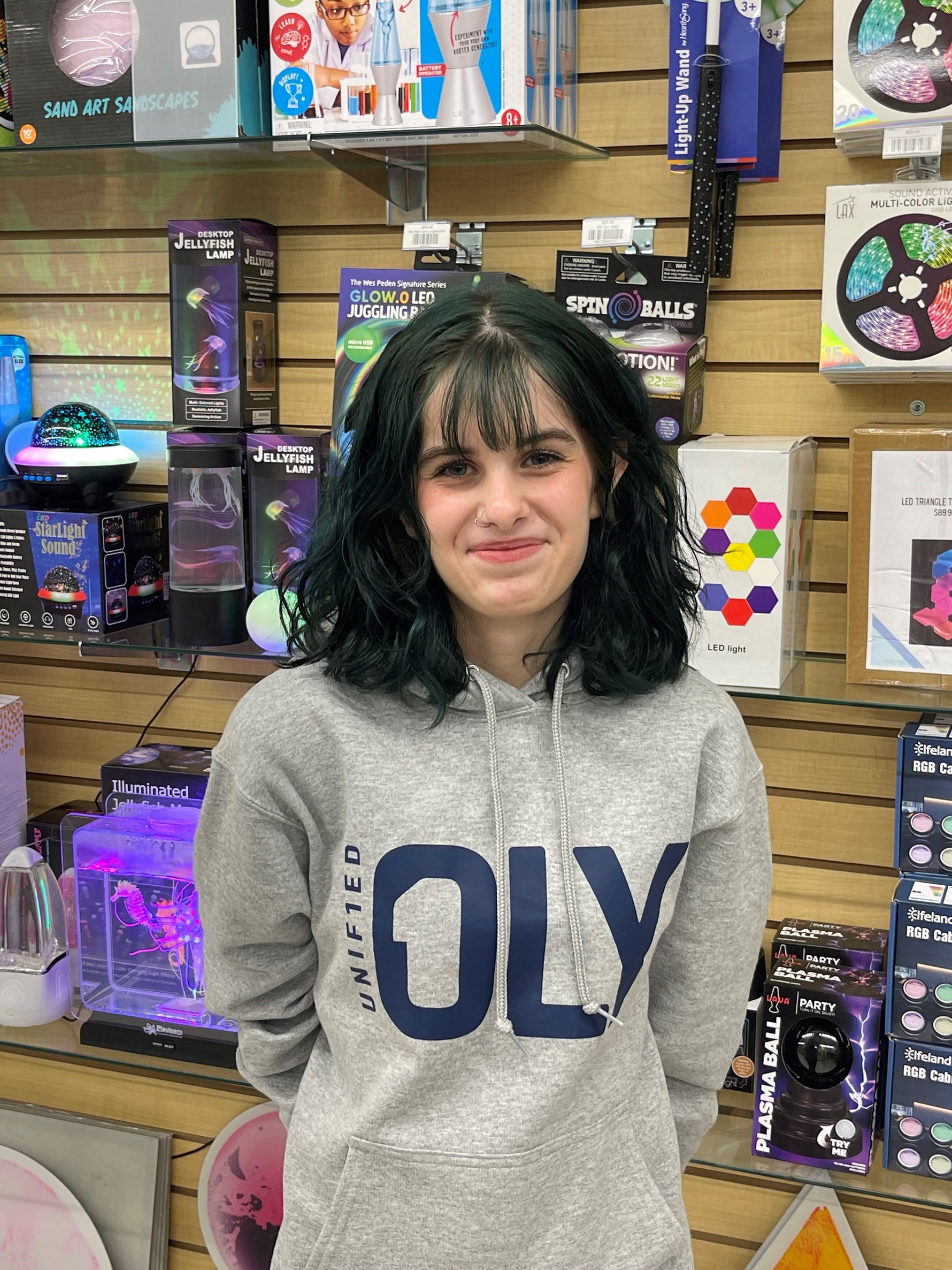 Girl smiling in a store