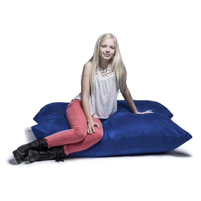 A child sits on the Jaxx 3.5 Saxx Kids Bean Bag.