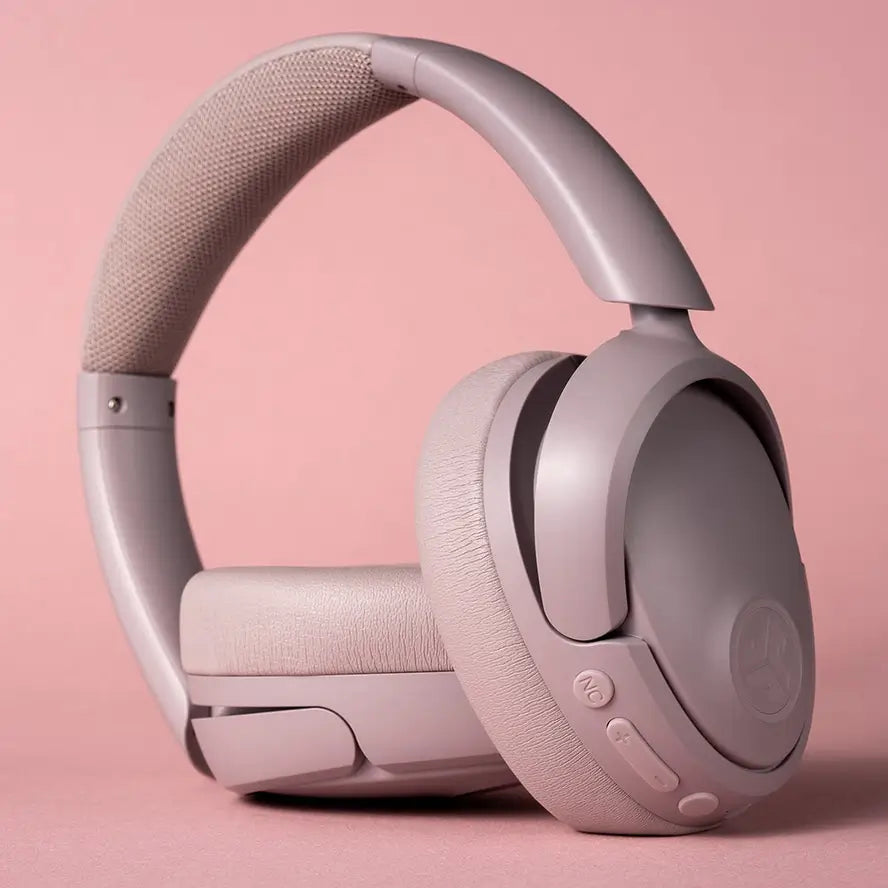 A stylized photo of the Mauve JLAB Jbuds Lux Active Noise Cancelling Headphones.