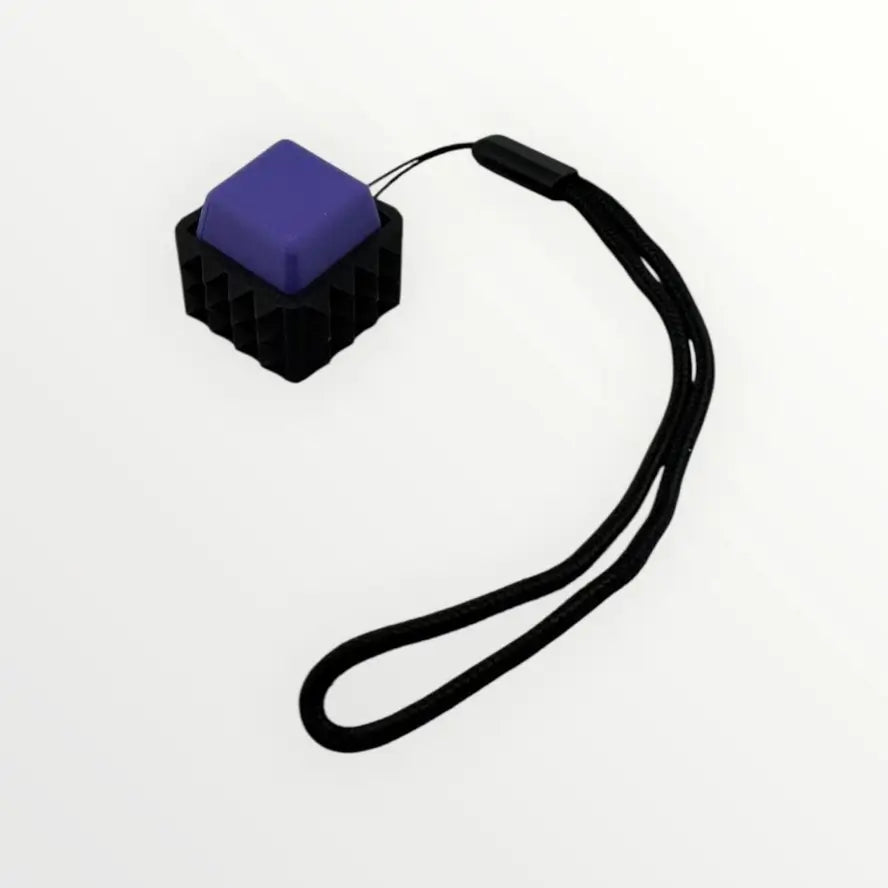 The purple Spiky Mechanical Keyboard Fidget - Clicky.