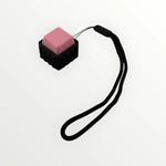 The pink Kahn Creations Spiky Mechanical Keyboard Fidget Keychain - Clicky.