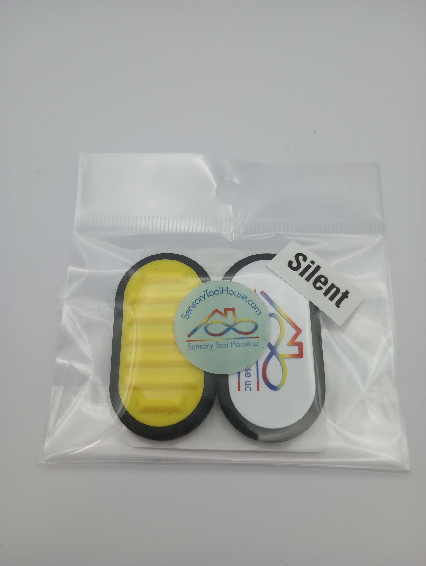 The The Spiky Silent Fidget Slider, Sensory Tool House Edition.