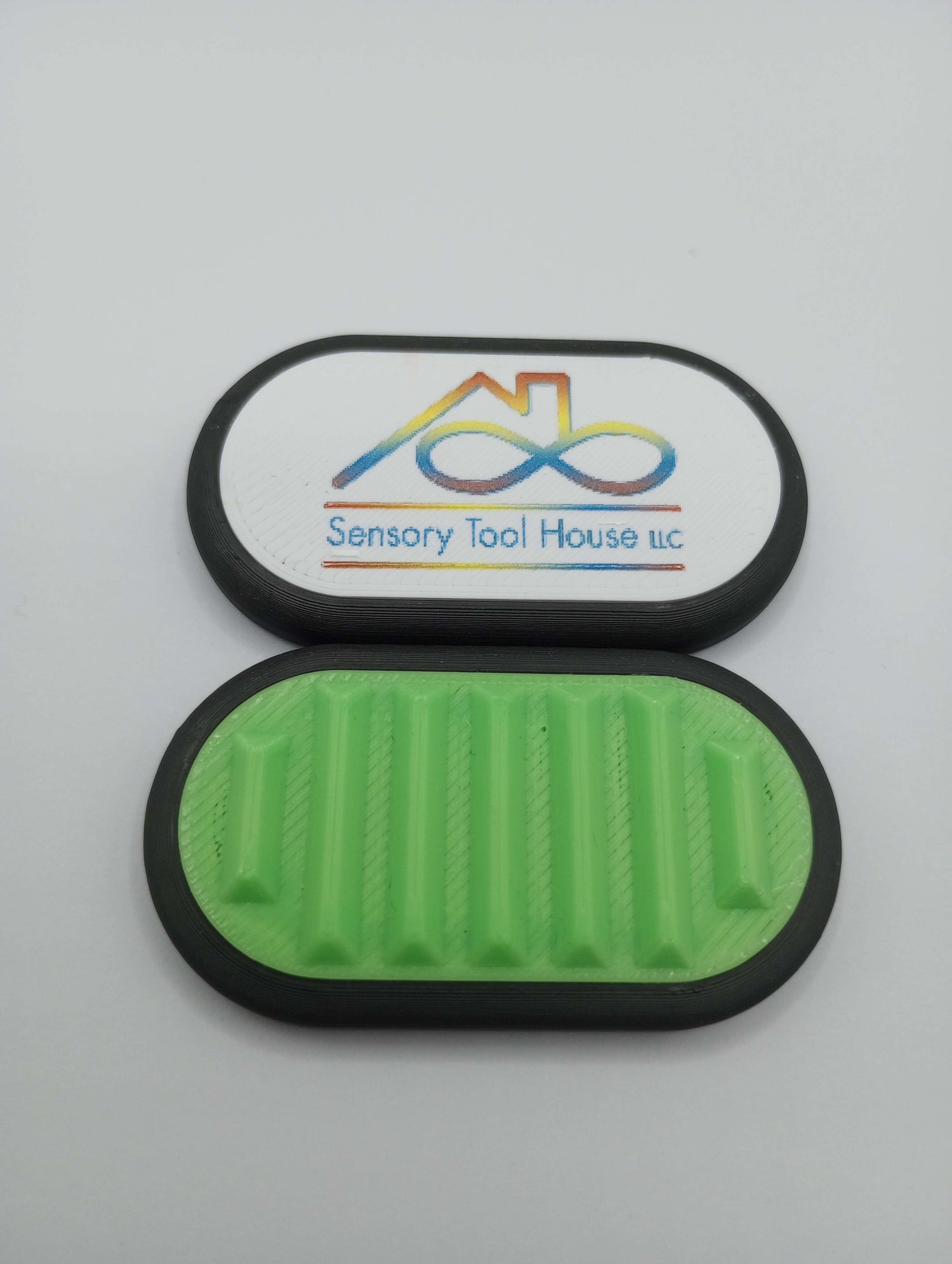 The Spiky Silent Fidget Slider, Sensory Tool House Edition.