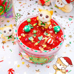 An open Meowy Christmas Cloud Slime sits on a shiny starry table cloth.