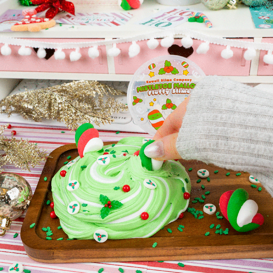 An animated GIF of the Mistletoe Mallow Fluffy Slime being stretched.