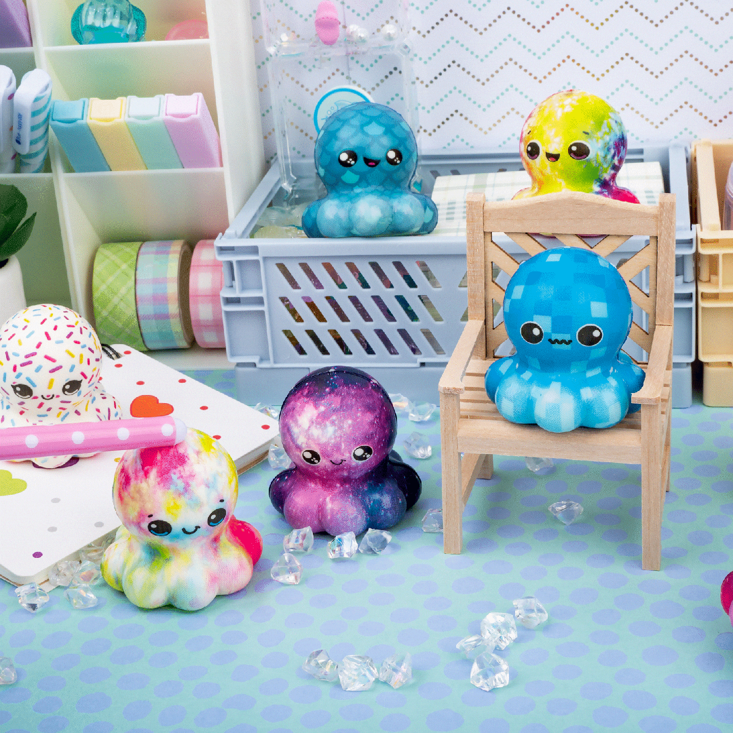An animated GIF of a wand booping several Octo-Squish Mini Squishies.