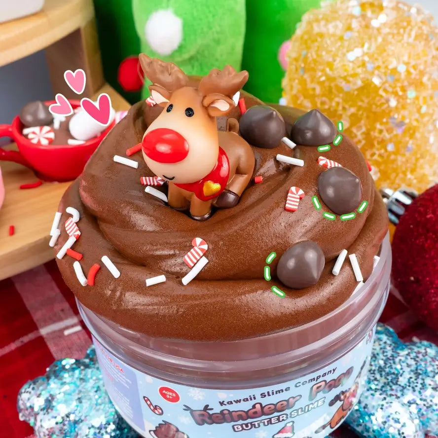 An overflowing jar of the Reindeer Poop Butter Slime with the squishy reindeer on top.